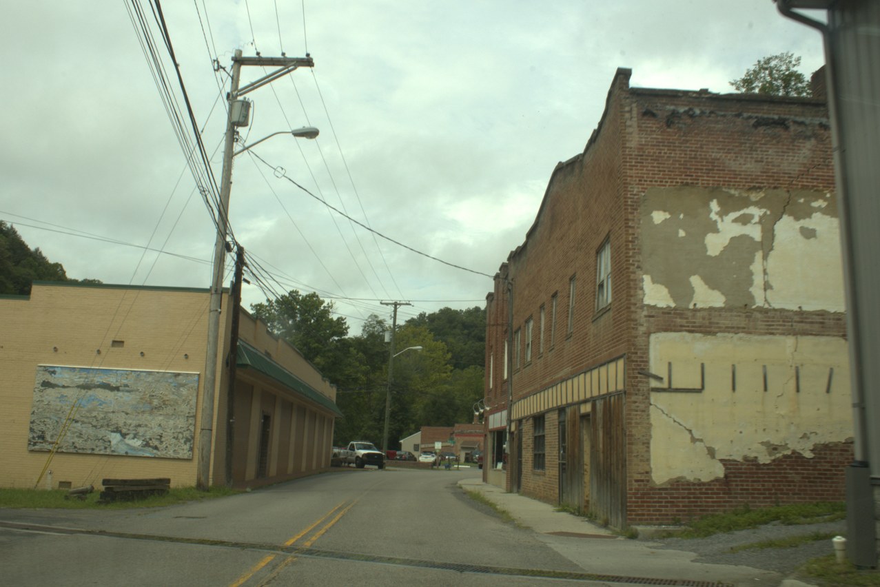 A downtown Haysi street lined with brick buildings.